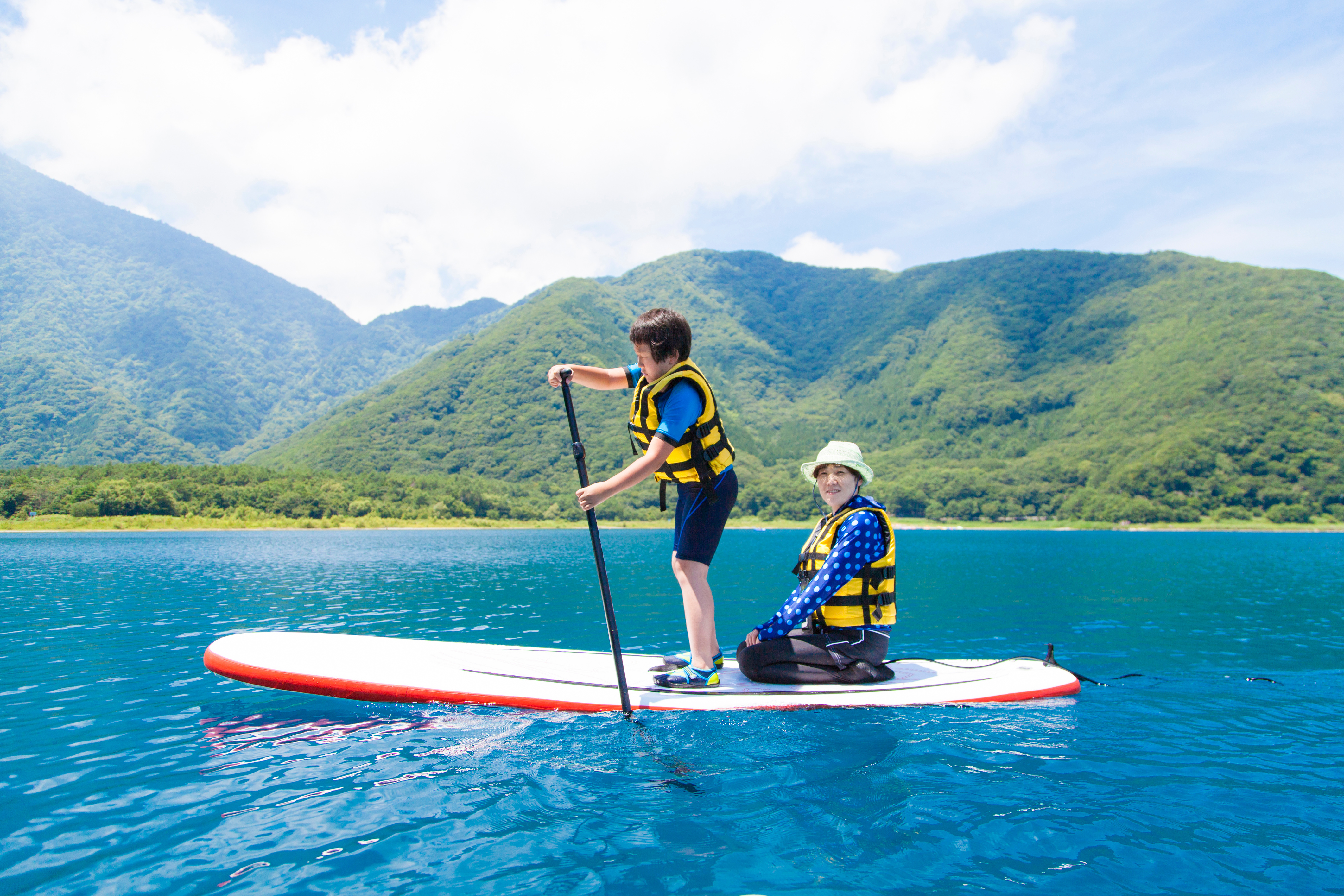 Stand up paddle boarding family